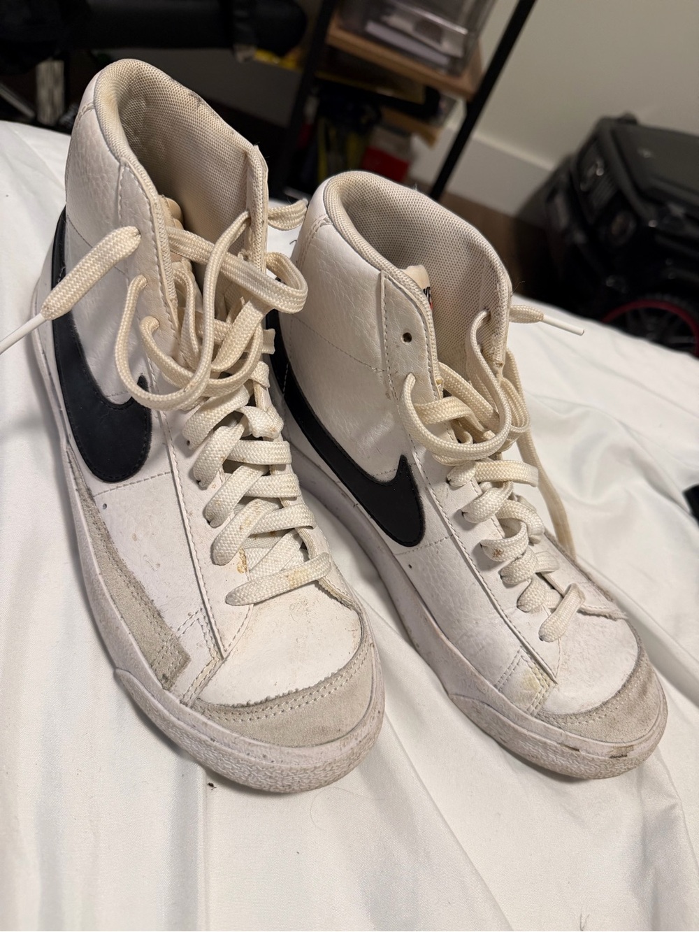 Nike Women's White High-Top Sneakers with Black Swoosh Accent